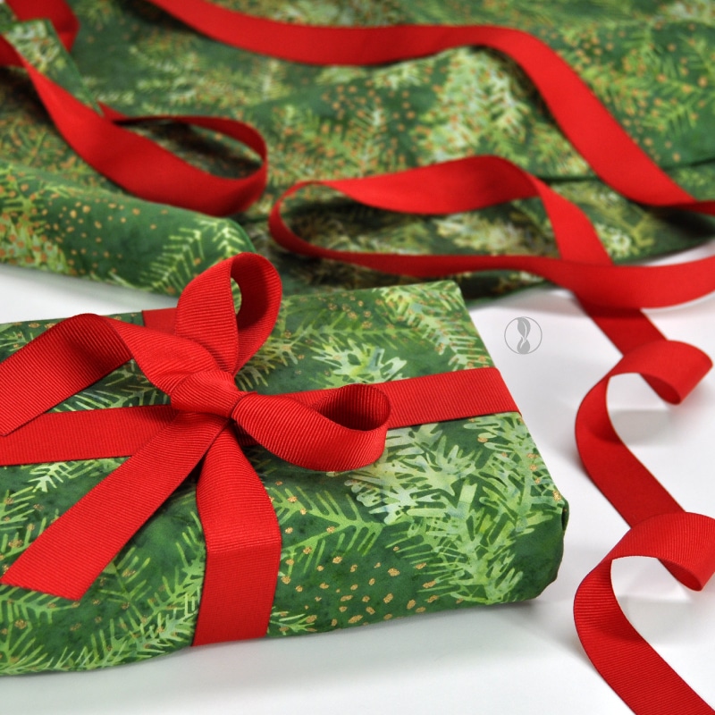 Christmas Forest Fabric Wrapping with Red Ribbon